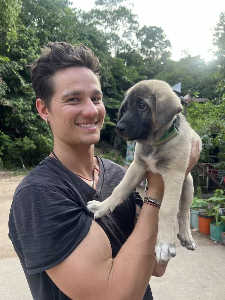 Evan holding puppy